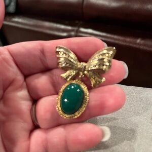 Elegant Gold and Green Bow Pendant